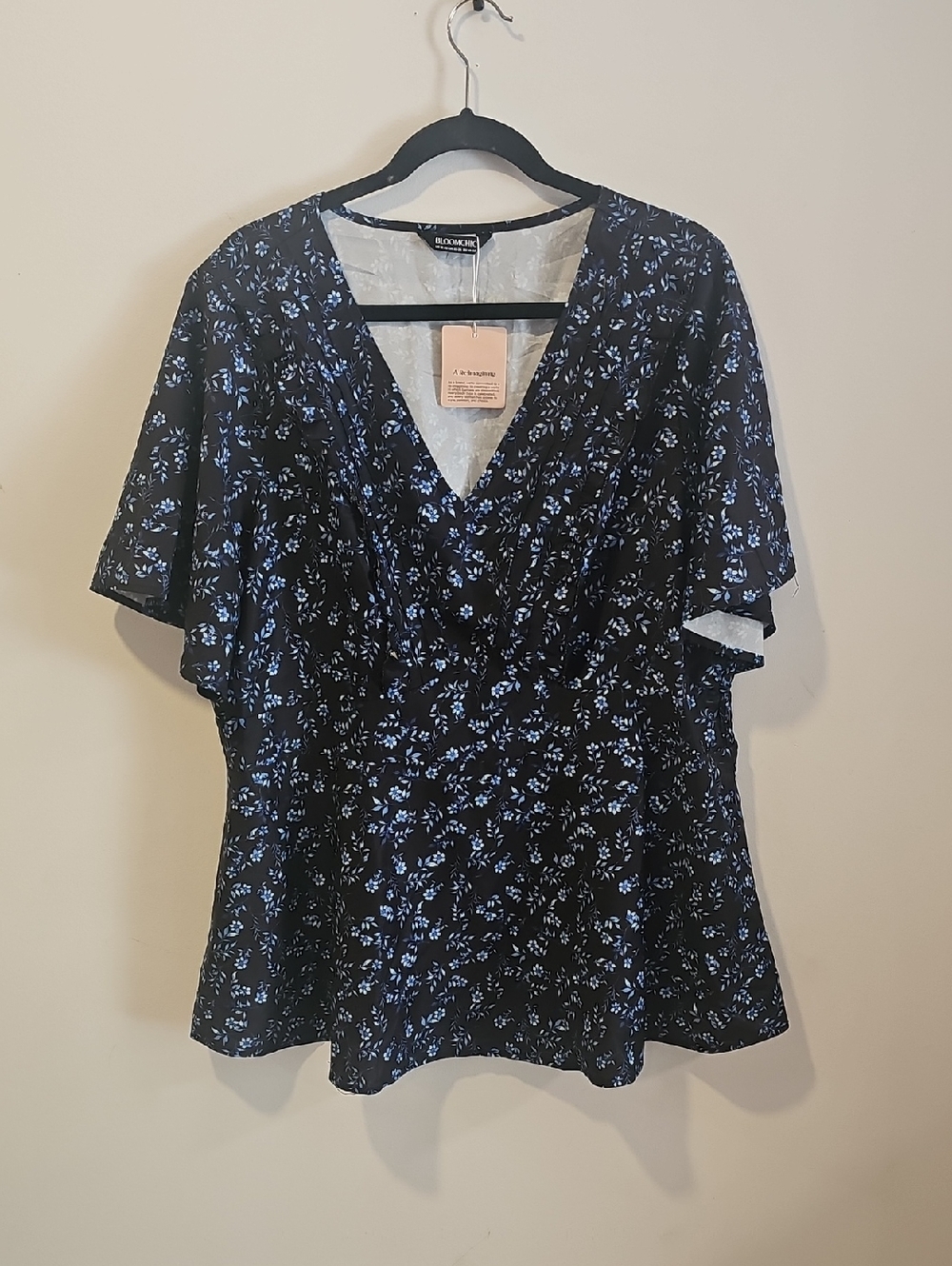 BloomChic Black V-Neck Flutter Sleeve Top with Blue Floral Print